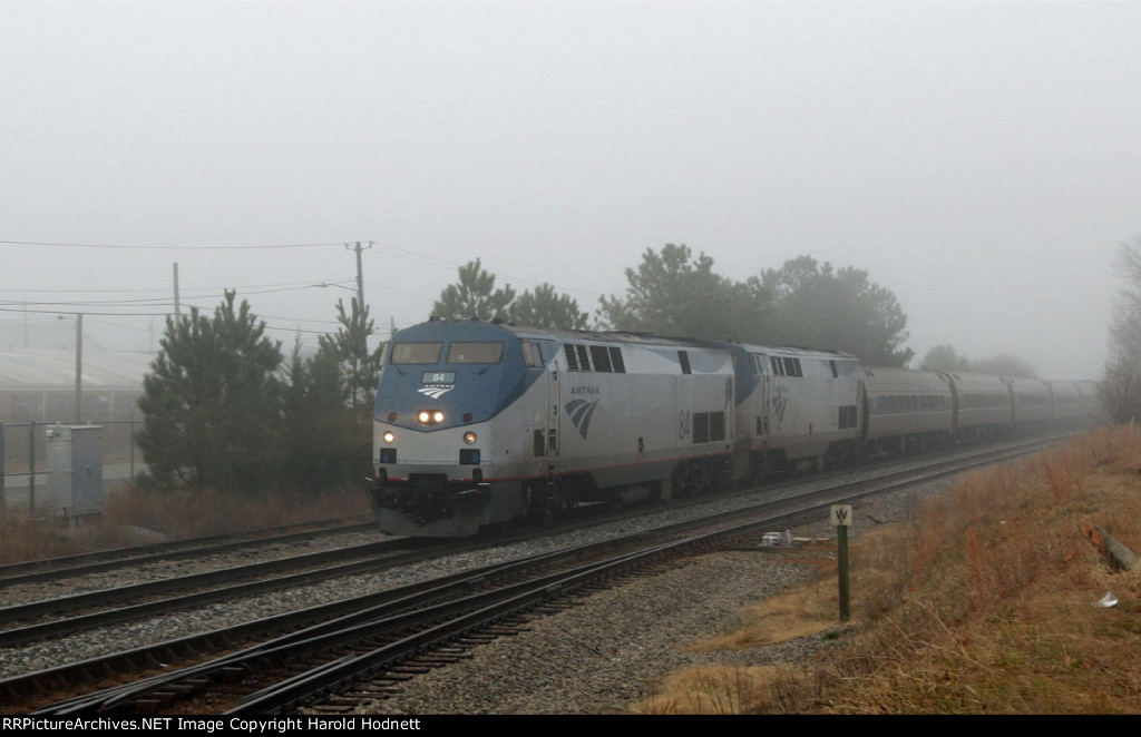 AMTK 84 & 82 lead train P092-14 past the Fairgrounds in the fog